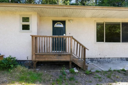 Exterior Rear Photo of 5754 Trout Lake Road, Halfmoon Bay, BC