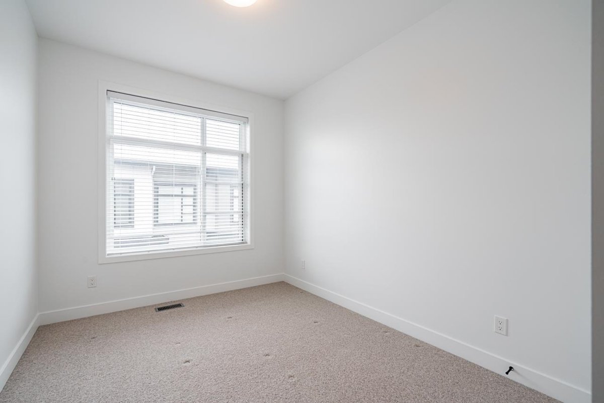 Basement Recreation Room Photo of 9 7127 193a Street, Surrey, BC