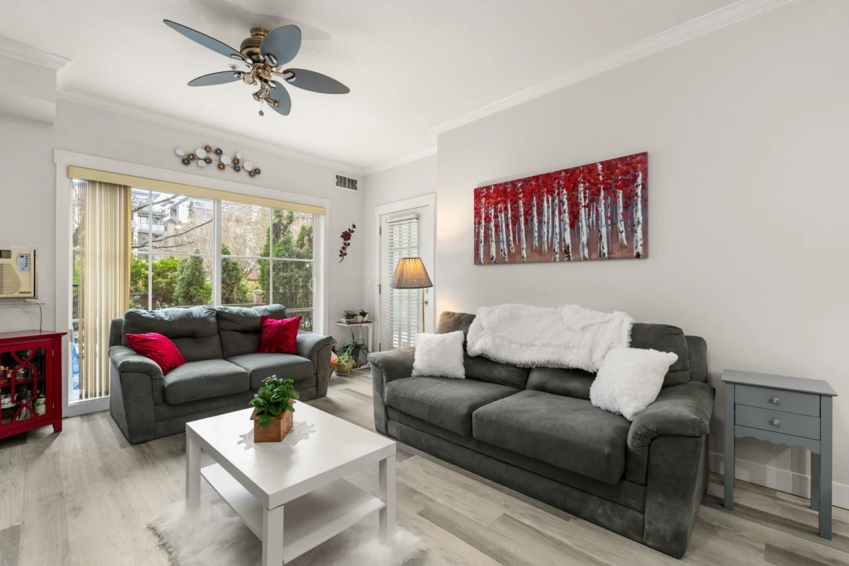 Family Room Photo of 104 17769 57 Avenue, Surrey, BC