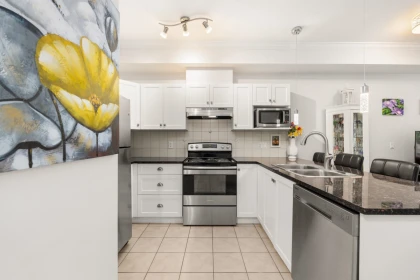 Primary Bedroom Photo of 104 17769 57 Avenue, Surrey, BC