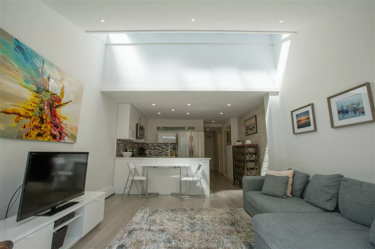 Family Room Photo of 106 1745 Esquimalt Avenue, West Vancouver, BC
