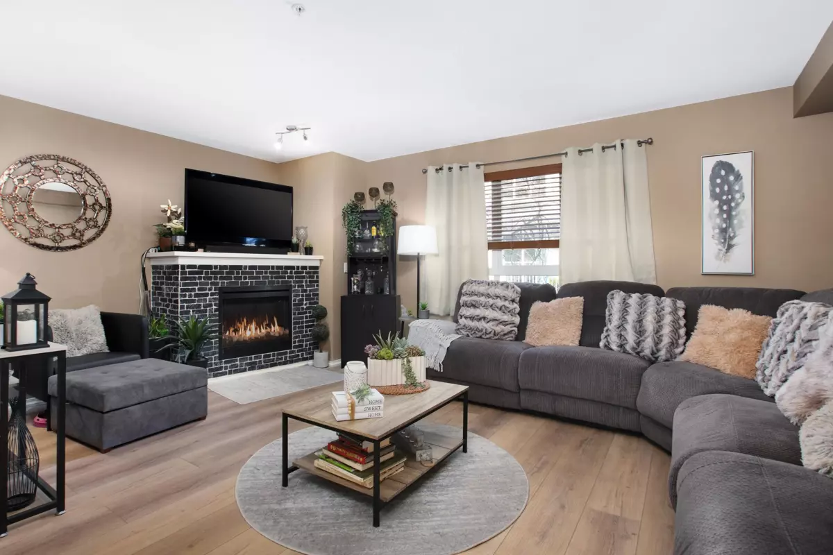 Living Room Photo of 107 6747 203 Street, Langley, BC