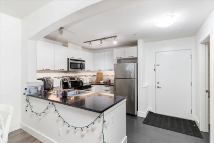 Kitchen Island Photo of 112 7478 Byrnepark Walk, Burnaby, BC