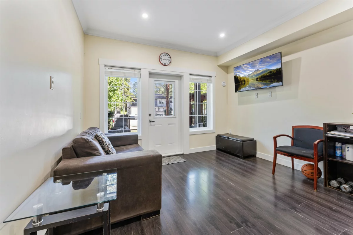 Family Room Photo of 34 7247 140 Street, Surrey, BC