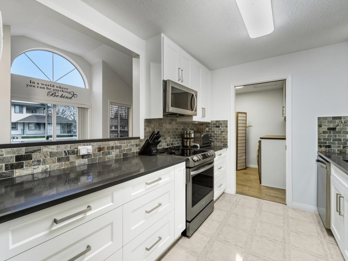 Living Room Photo of 402 19645 64 Avenue, Langley, BC