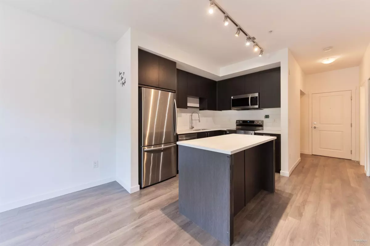 Family Room Photo of 103 13623 81a Avenue, Surrey, BC