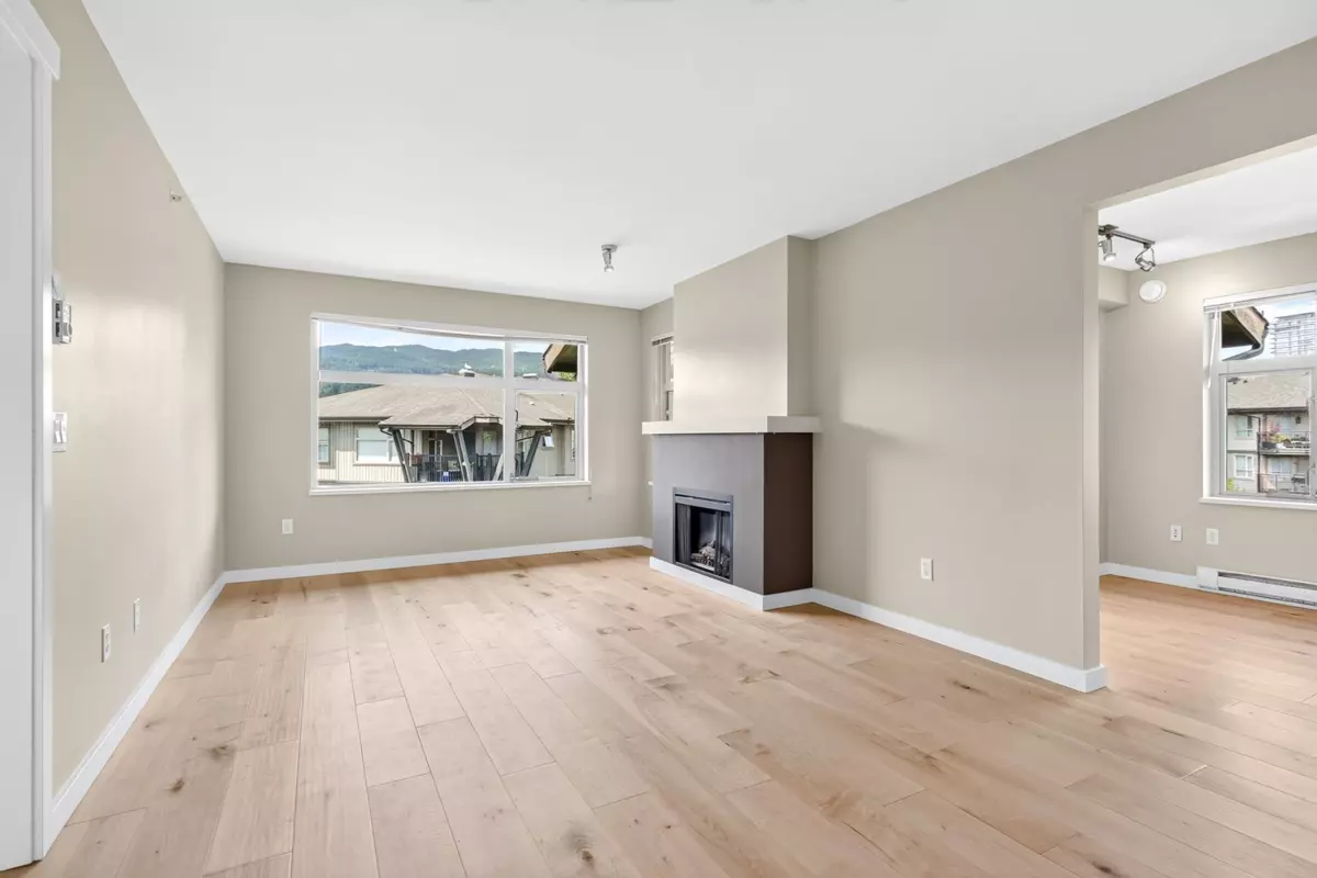 Living Room Photo of 406 500 Klahanie Drive, Port Moody, BC