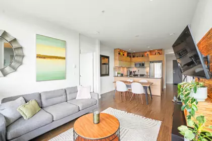 Living Room Photo of 316 9150 University High Street, Burnaby, BC