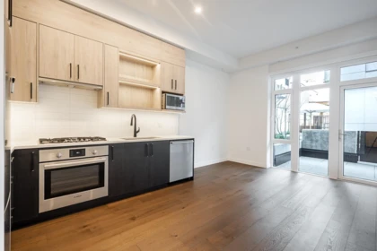 Kitchen Island Photo of 105 6859 Cambie Street, Vancouver, BC