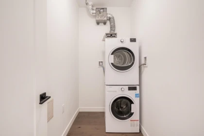 Laundry Room Photo of 105 6859 Cambie Street, Vancouver, BC