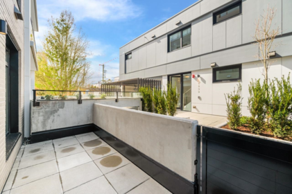 Kitchen Island Photo of 104 6859 Cambie Street, Vancouver, BC
