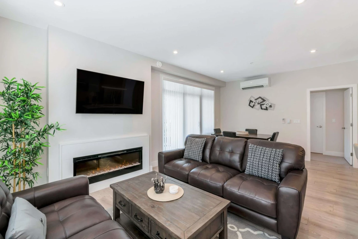 Living Room Photo of 101 45500 Market Way, Chilliwack, BC