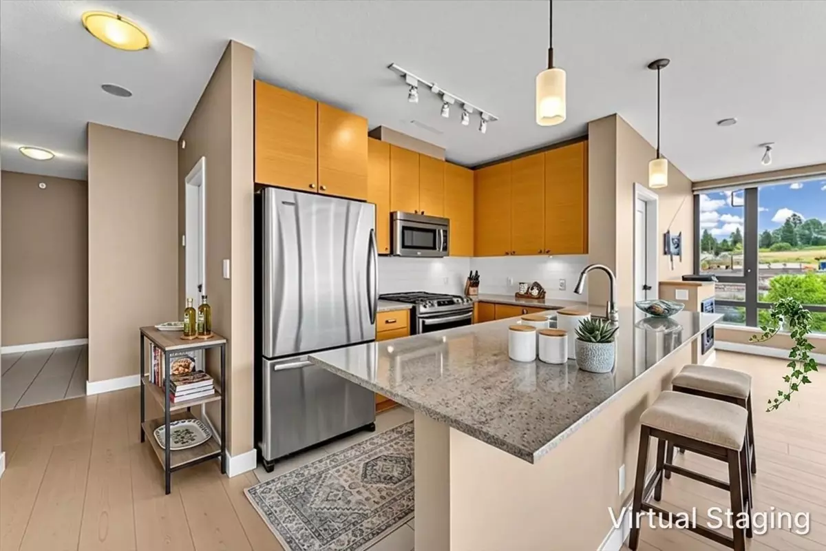 Living Room Photo of 702 110 Brew Street, Port Moody, BC