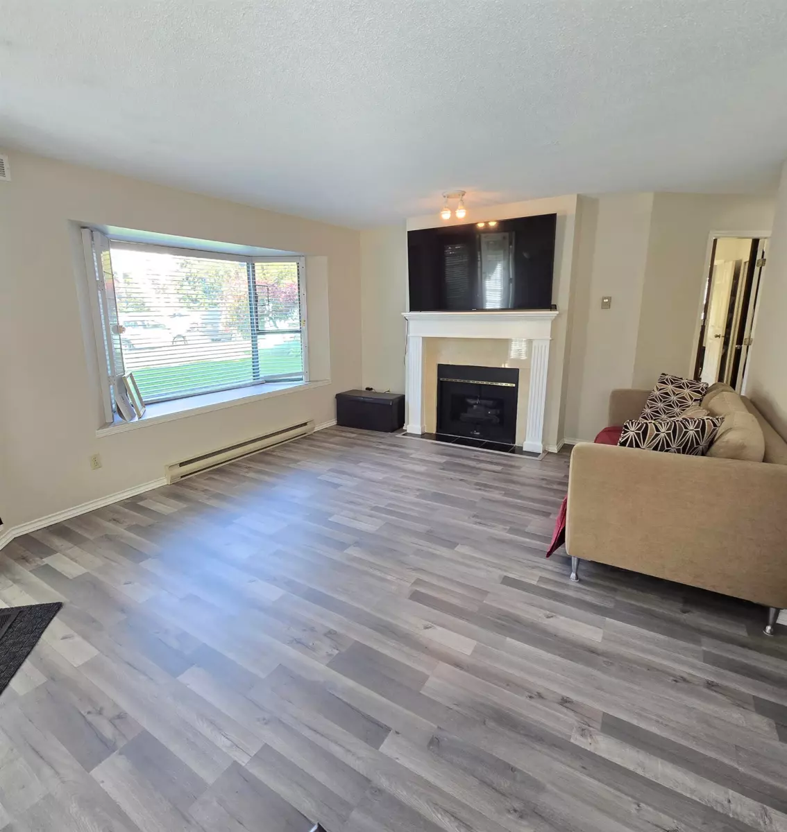 Living Room Photo of 109 5250 Victory Street, Burnaby, BC