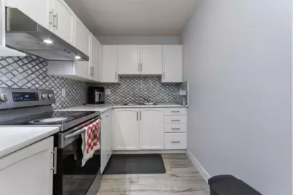 Kitchen Island Photo of 311 2964 Trethewey Street, Abbotsford, BC