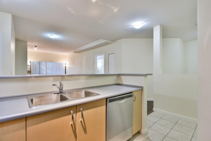 Family Room Photo of 120 10866 City Parkway, Surrey, BC