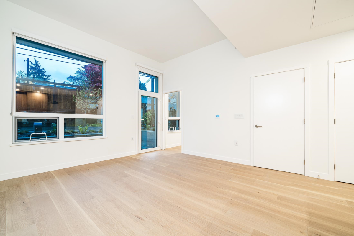 Living Room Photo of 108 5212 Cambie Street, Vancouver, BC