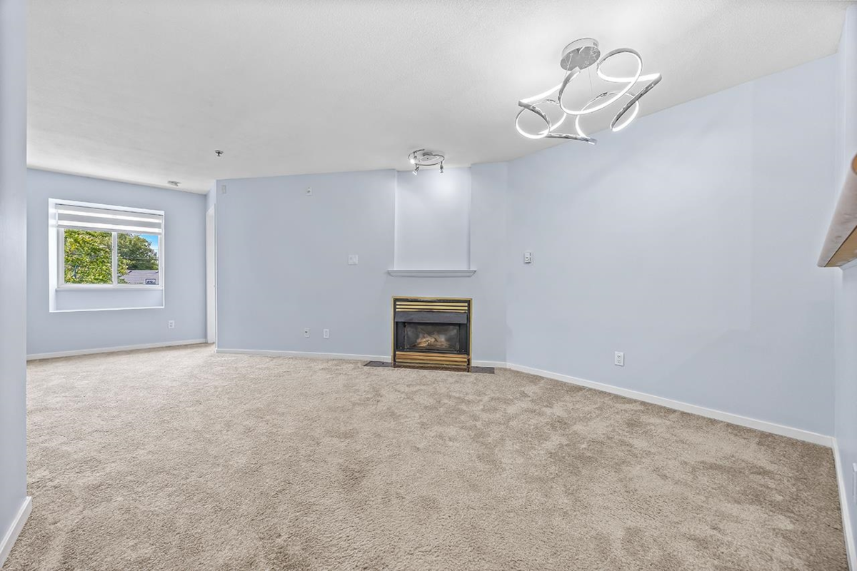 Family Room Photo of 211 868 Kingsway, Vancouver, BC