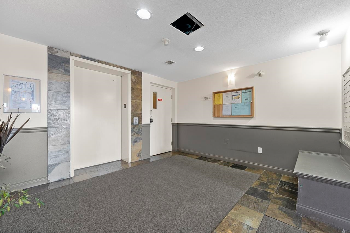 Living Room Photo of 211 868 Kingsway, Vancouver, BC