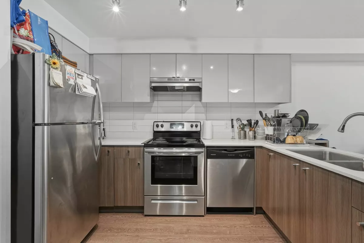 Living Room Photo of 313 10688 140 Street, Surrey, BC