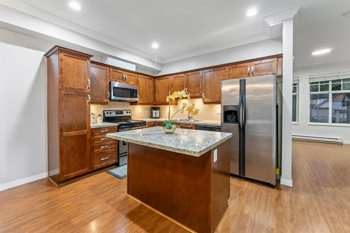 Family Room Photo of 25 14462 61a Avenue, Surrey, BC