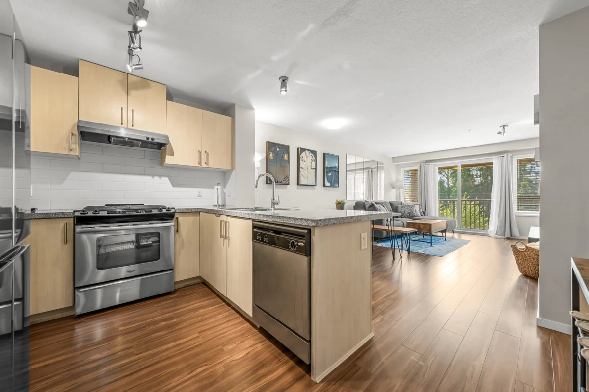 Living Room Photo of 307 3178 Dayanee Springs Boulevard, Coquitlam, BC