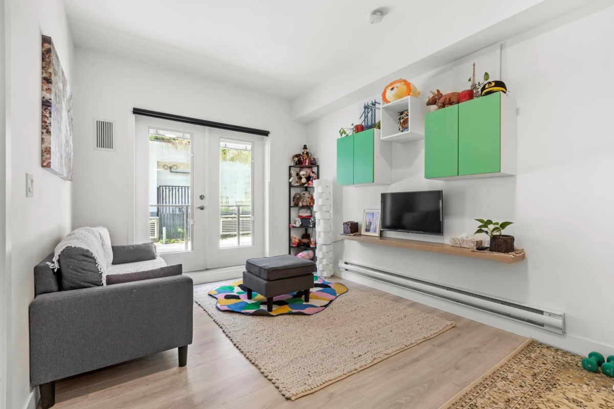 Family Room Photo of 102 2688 Duke Street, Vancouver, BC