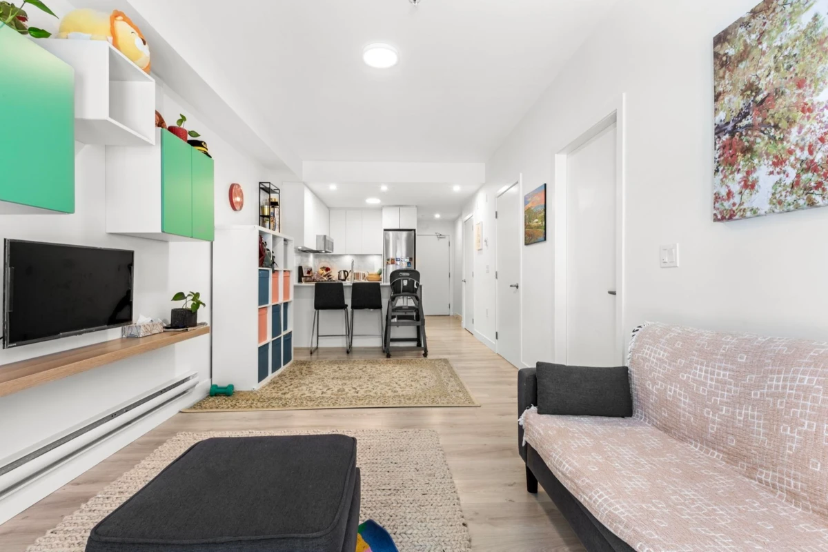 Living Room Photo of 102 2688 Duke Street, Vancouver, BC