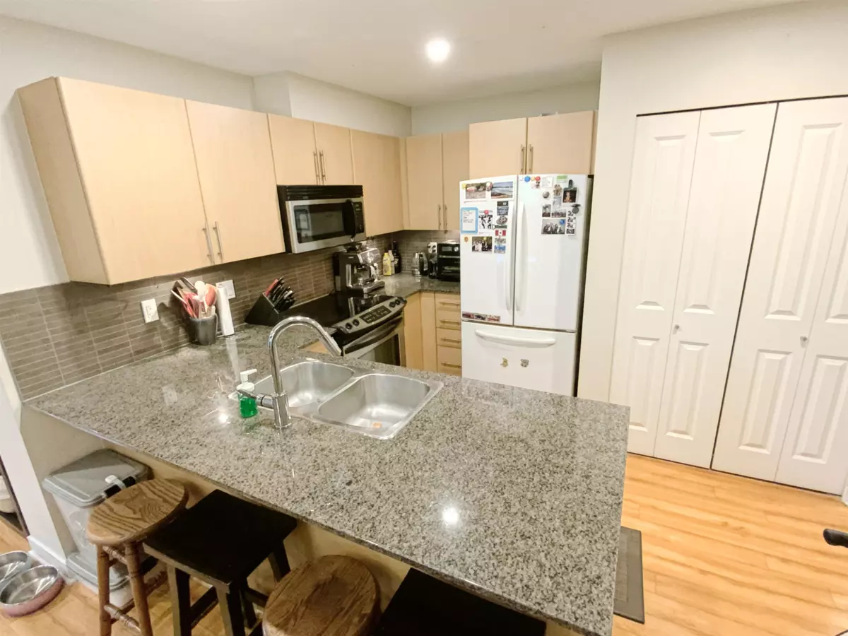 Living Room Photo of A106 8929 202 Street, Langley, BC