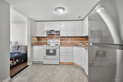 Kitchen Island Photo of 306 13780 76 Avenue, Surrey, BC