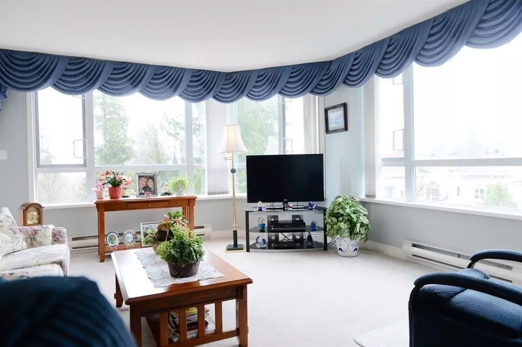 Living Room Photo of 301 3190 Gladwin Road, Abbotsford, BC