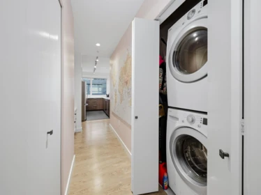 Laundry Room Photo of 316 9250 University High Street, Burnaby, BC