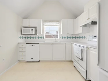 Kitchen Island Photo of 406 5556 14 Avenue, Delta, BC