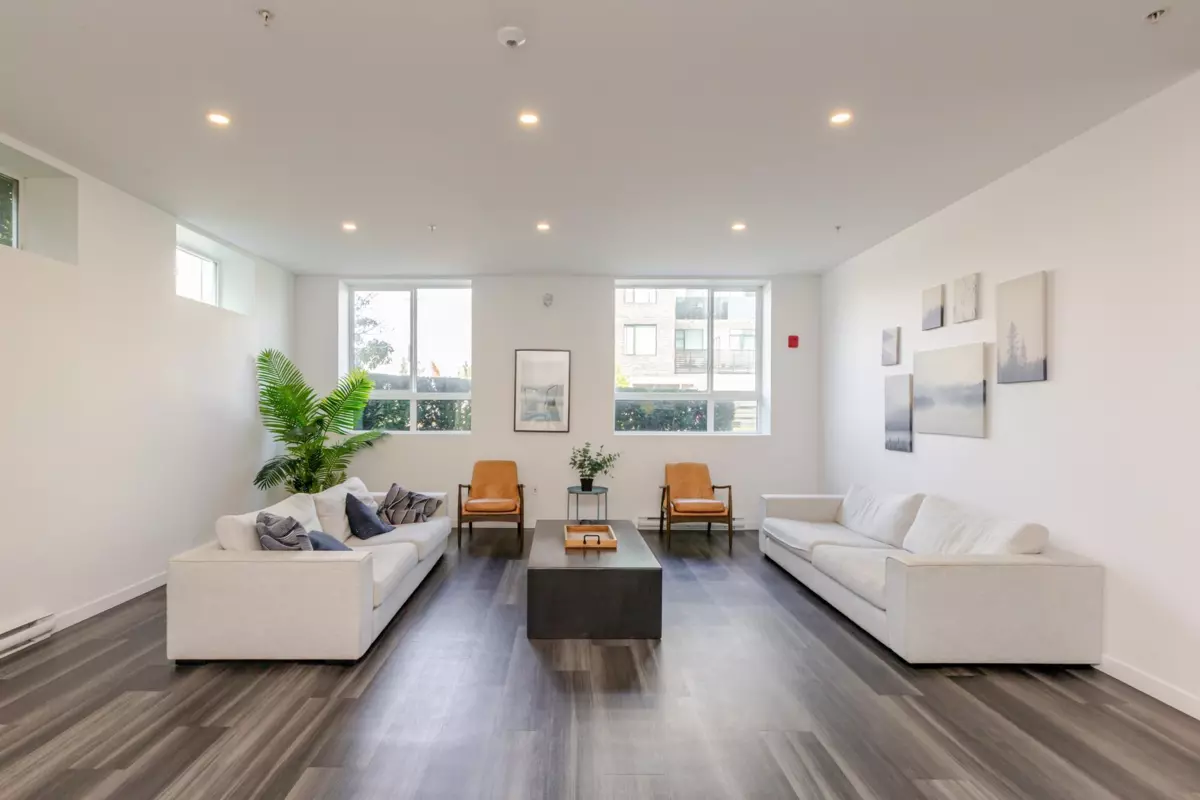 Living Room Photo of 302 13628 81a Avenue, Surrey, BC
