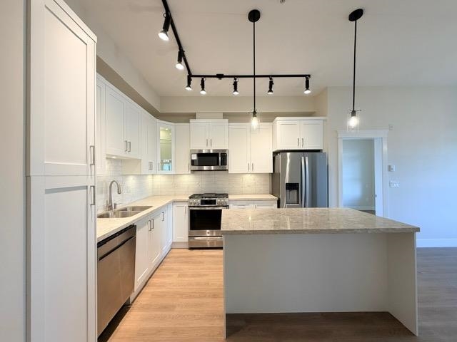 Living Room Photo of 420 20932 83 Avenue, Langley, BC