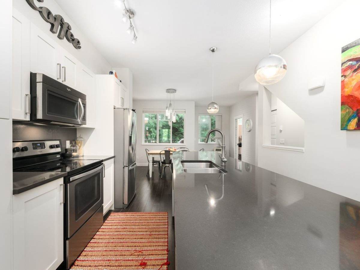 Family Room Photo of 29 13864 Hyland Road, Surrey, BC