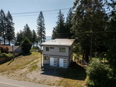 Aerial View of 7835 Redrooffs Road, Halfmoon Bay, BC