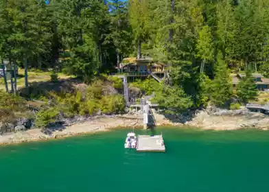 Front exterior of 1010 Taki-Te-Si Road, Gambier Island, BC