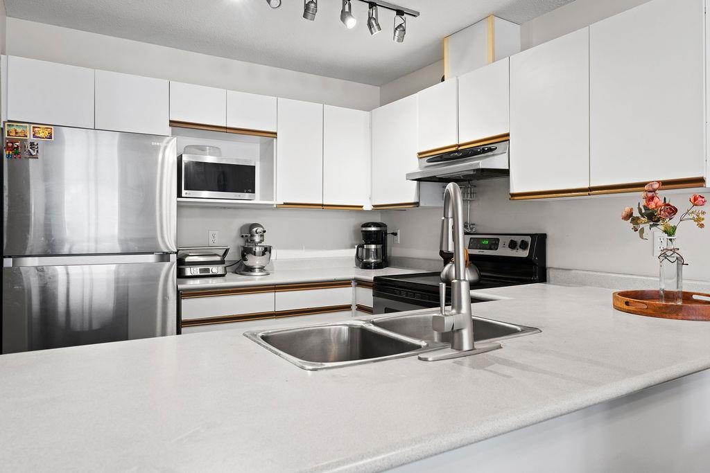 Walk-In Closet Photo of 413 1220 Lasalle Place, Coquitlam, BC