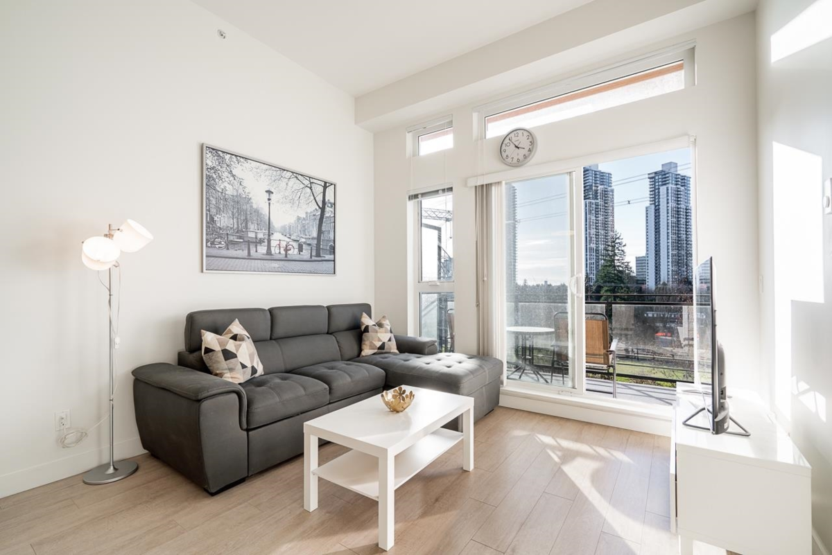 Living Room Photo of 401 13919 Fraser Highway, Surrey, BC