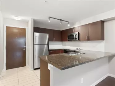 Living Room Photo of 209 7337 Macpherson Avenue, Burnaby, BC