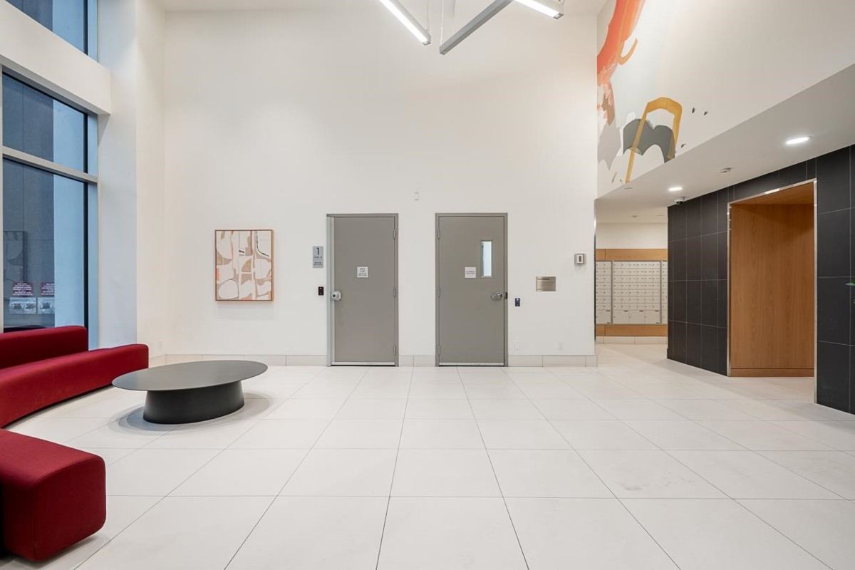 Living Room Photo of 910 318 Alderson Avenue, Coquitlam, BC