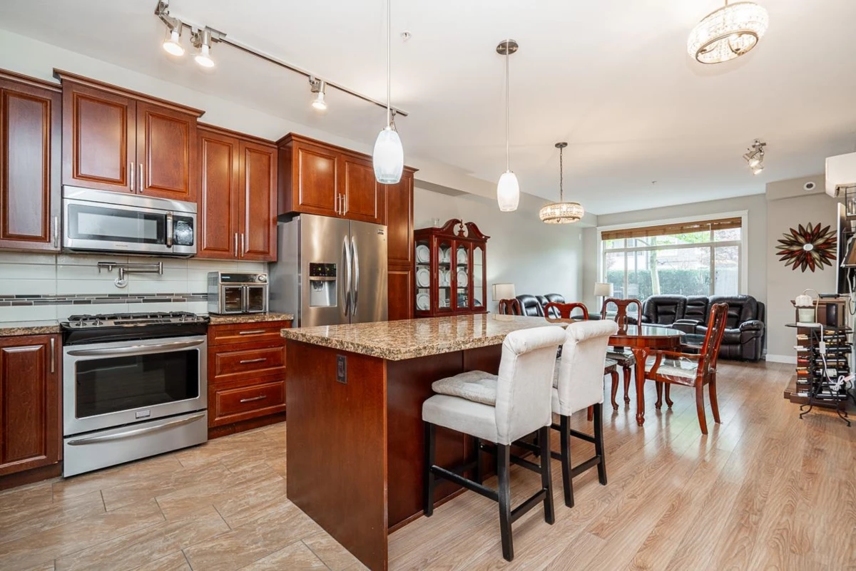Living Room Photo of 105 8157 207 Street, Langley, BC