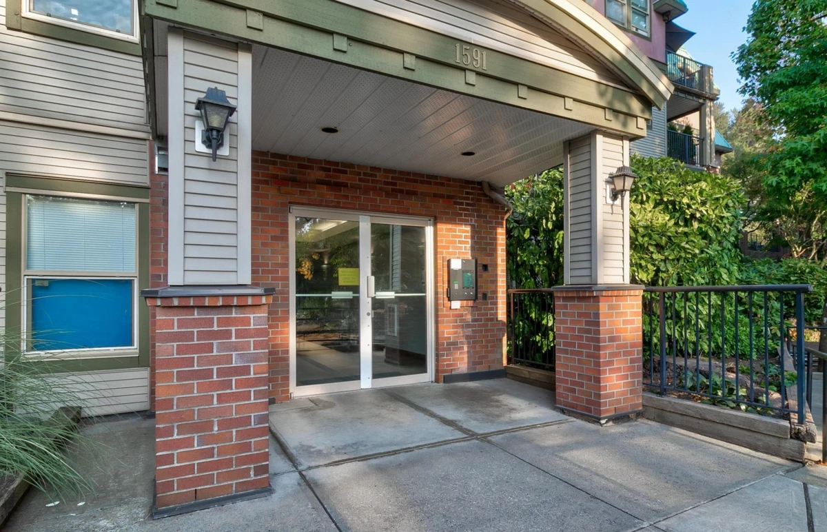 Exterior Rear Photo of 101 1591 Booth Avenue, Coquitlam, BC