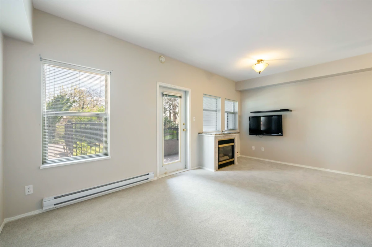 Living Room Photo of 101 1591 Booth Avenue, Coquitlam, BC