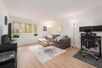 Family Room Photo of 104 1330 Graveley Street, Vancouver, BC