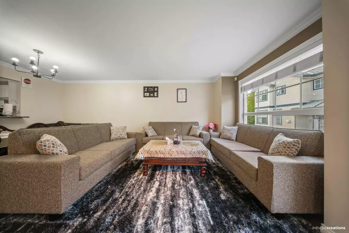 Living Room Photo of 703 9118 149 Street, Surrey, BC