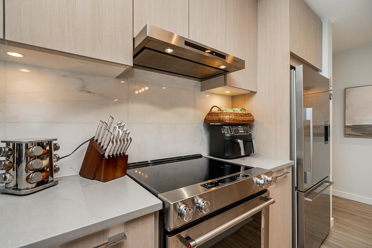 Kitchen Island Photo of 401 6438 Byrnepark Drive, Burnaby, BC