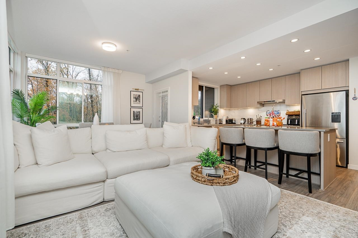 Living Room Photo of 401 6438 Byrnepark Drive, Burnaby, BC