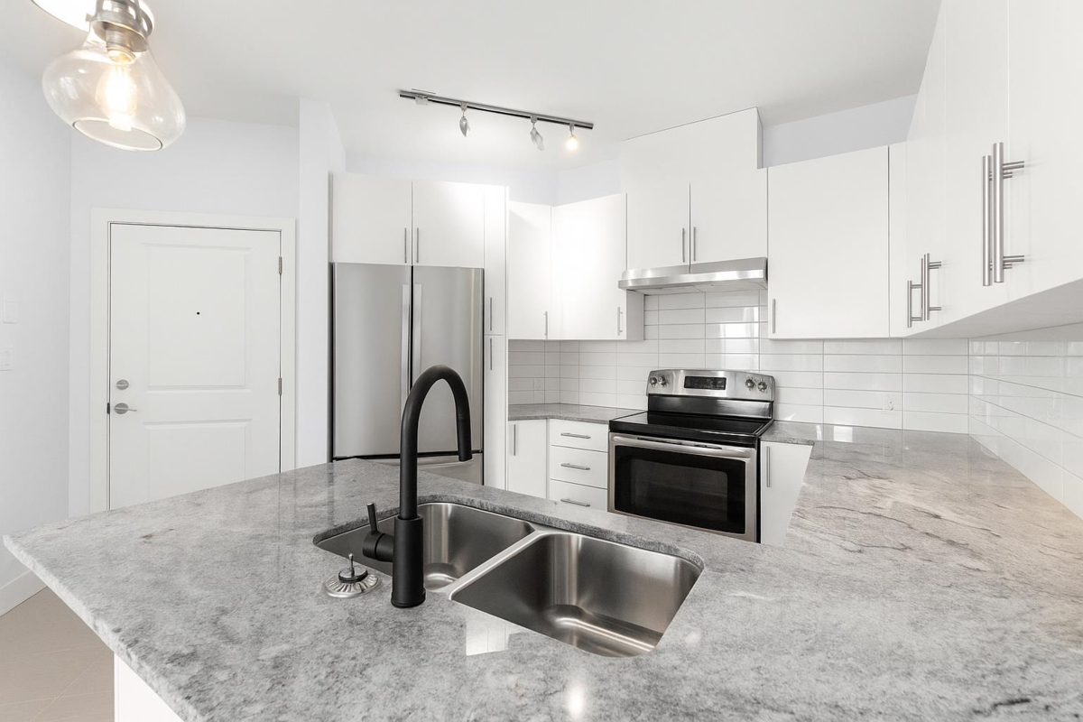 Living Room Photo of 412 15956 86a Avenue, Surrey, BC